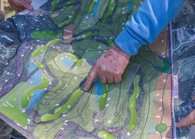 Demonstrating how a landing area should be oriented by Pete Dye.